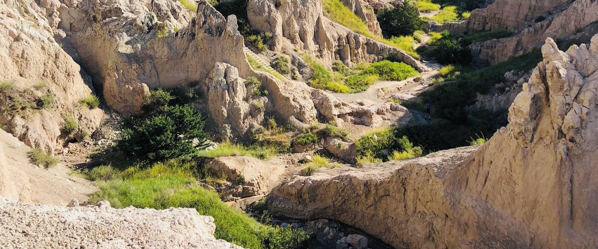 The Badlands National Park is not one to miss!!! This canyon is stunning, but be sure to beat the beast, else you might not enjoy it as much! #adventure