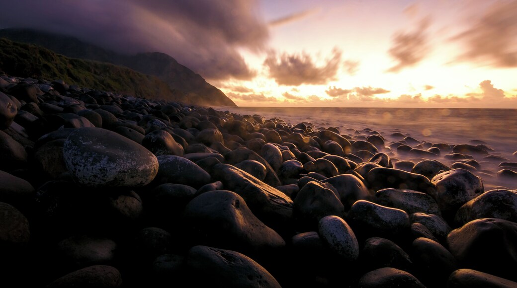 This is one of my favorite memories from my first trip to the magical isles of Batanes more than three years ago. I remember it was a cold misty morning standing all alone surrounded by thousands of boulders blanketing the shores of Valugan Beach. For miles in every direction, there was no movement except the constant crashing of the waves against these rocks and the slow steady rolling of the clouds across the morning sky and even over the towering silhouette of Mt Iraya. Unfazed by the sea spray, I became the sole spectator of what I happily imagined was a spectacle prepared by nature especially for me. And it was beyond glorious.