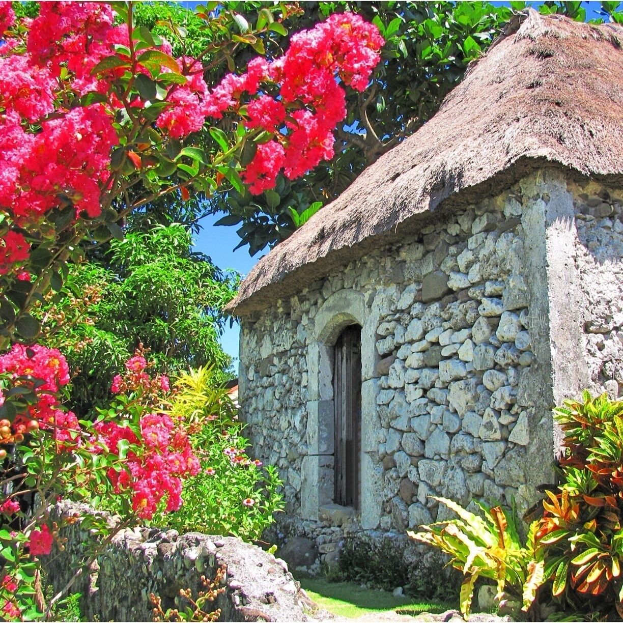 A traditional Ivatan stone house. It is made of thick limestone walls to withstand strong winds. #Batanes #Philippines
