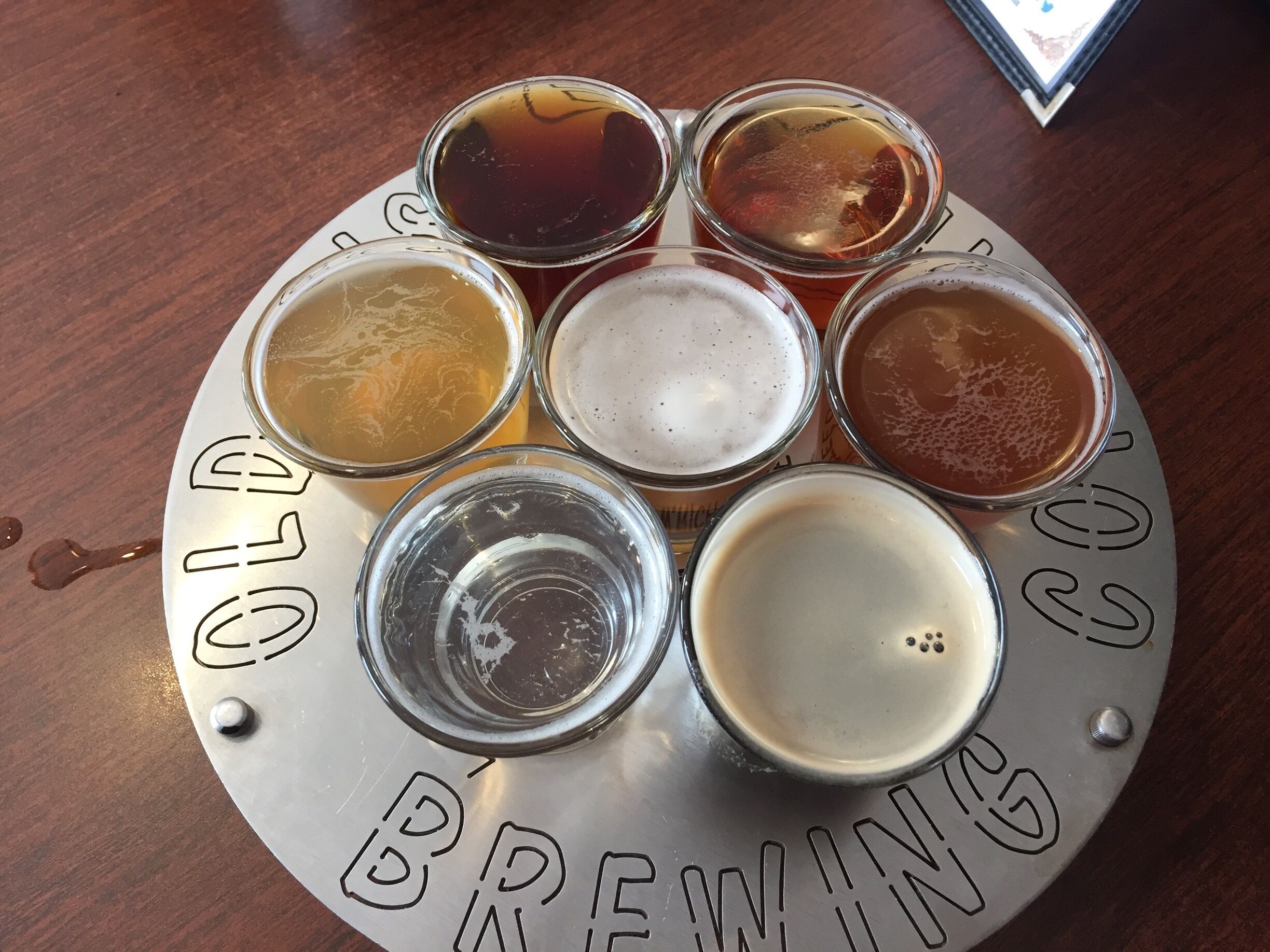 Trying out the sampler. Six locally brewed beers and a local wine!  