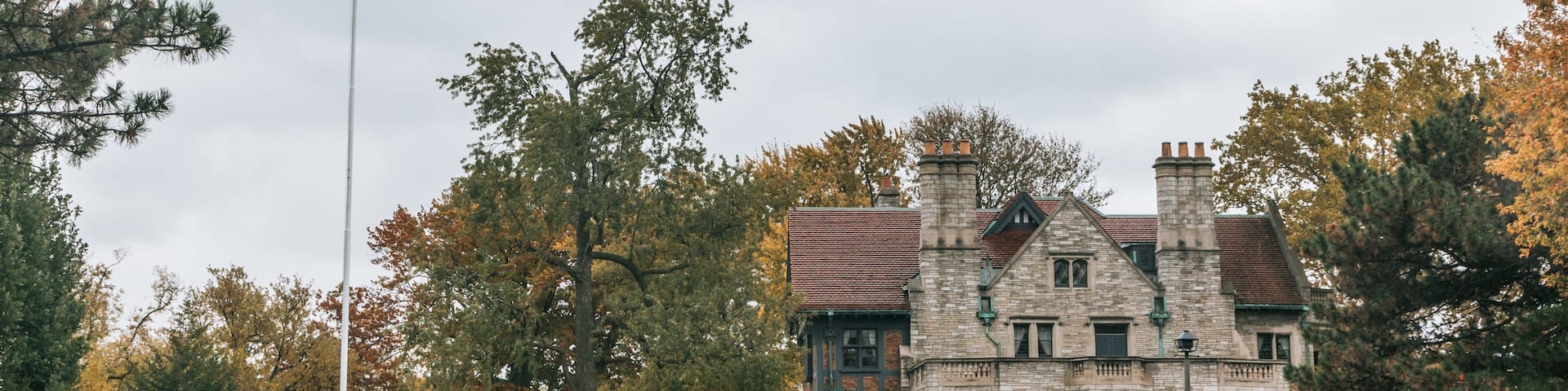 Willistead Park Trail Trailhead featuring a park, heritage elements and a house