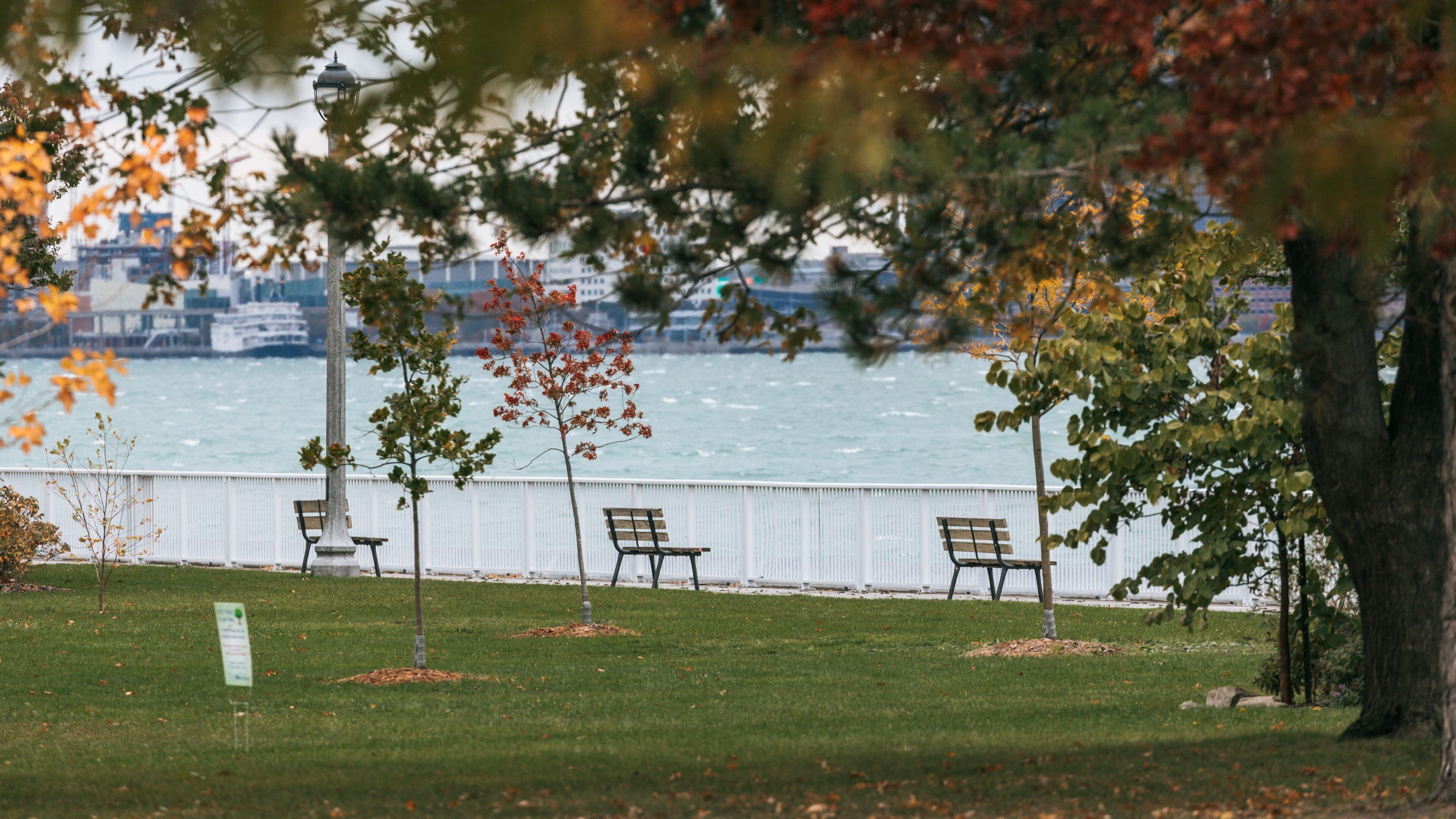Reaume Park and Coventry Gardens Walking Trails Trailhead featuring a garden and a bay or harbor