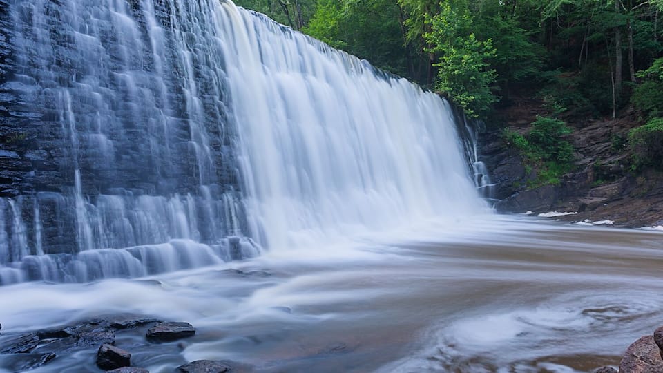 A beautiful feature about the Atlanta Metro area is that it is not devoid of all green space. The Southern cities in the United States have embraced nature as they develop. Vickery Creek Falls is one such park that the city seems to melt away and you are transported right into nature. The trails are fairly easy to navigate and the inclines are gentle making for a stress free, picturesque stroll along side the banks of Big Creek. For a little more challenge complete the 4.7 loop that will take you past the spillway waterfall, historic mill and across a covered bridge. All this beauty is located right in the heart of Roswell just outside of Atlanta.