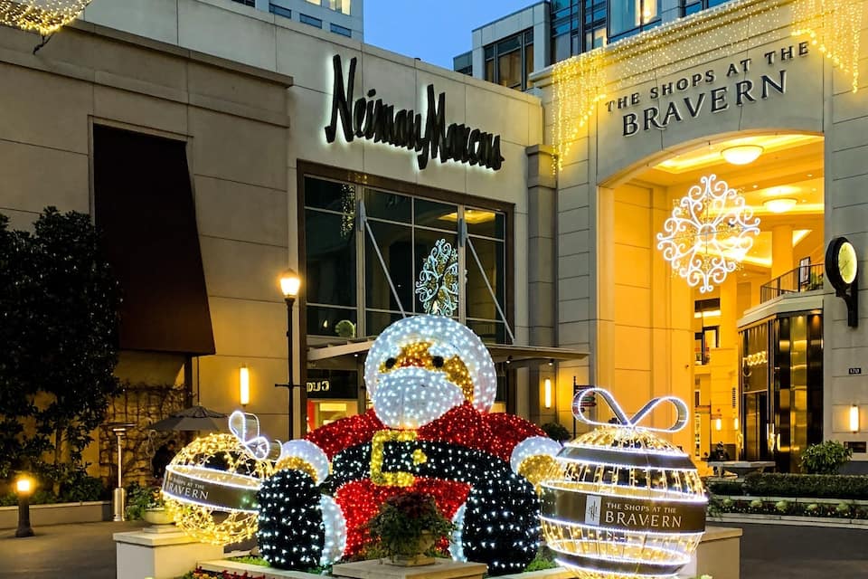 A Neiman Marcus store with illuminated Christmas decorations.
