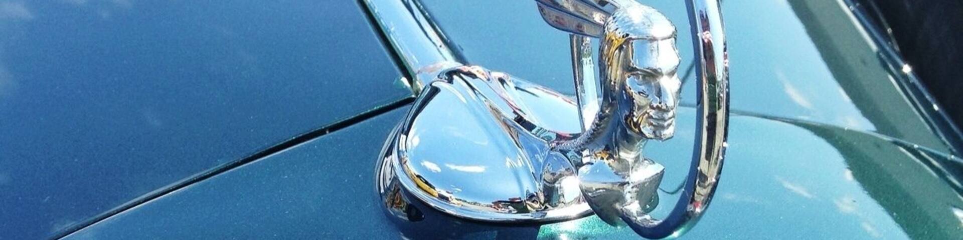 Hood ornament from a 1934 Pontiac Convertible, as seen at the Old Rides Car Club show. I almost want one of these to mount on my hood - so much cooler than a boring BMW roundel.
About 50 cars turned up for the show, including a number of 1930s era restorations, 1950s era large-finned classics, and even a few more recent novelties like a 1990s Ferrari Testarossa. View the complete show schedule at www.oldridescarclub.com.