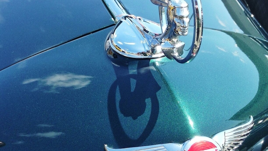 Hood ornament from a 1934 Pontiac Convertible, as seen at the Old Rides Car Club show. I almost want one of these to mount on my hood - so much cooler than a boring BMW roundel.
About 50 cars turned up for the show, including a number of 1930s era restorations, 1950s era large-finned classics, and even a few more recent novelties like a 1990s Ferrari Testarossa. View the complete show schedule at www.oldridescarclub.com.
