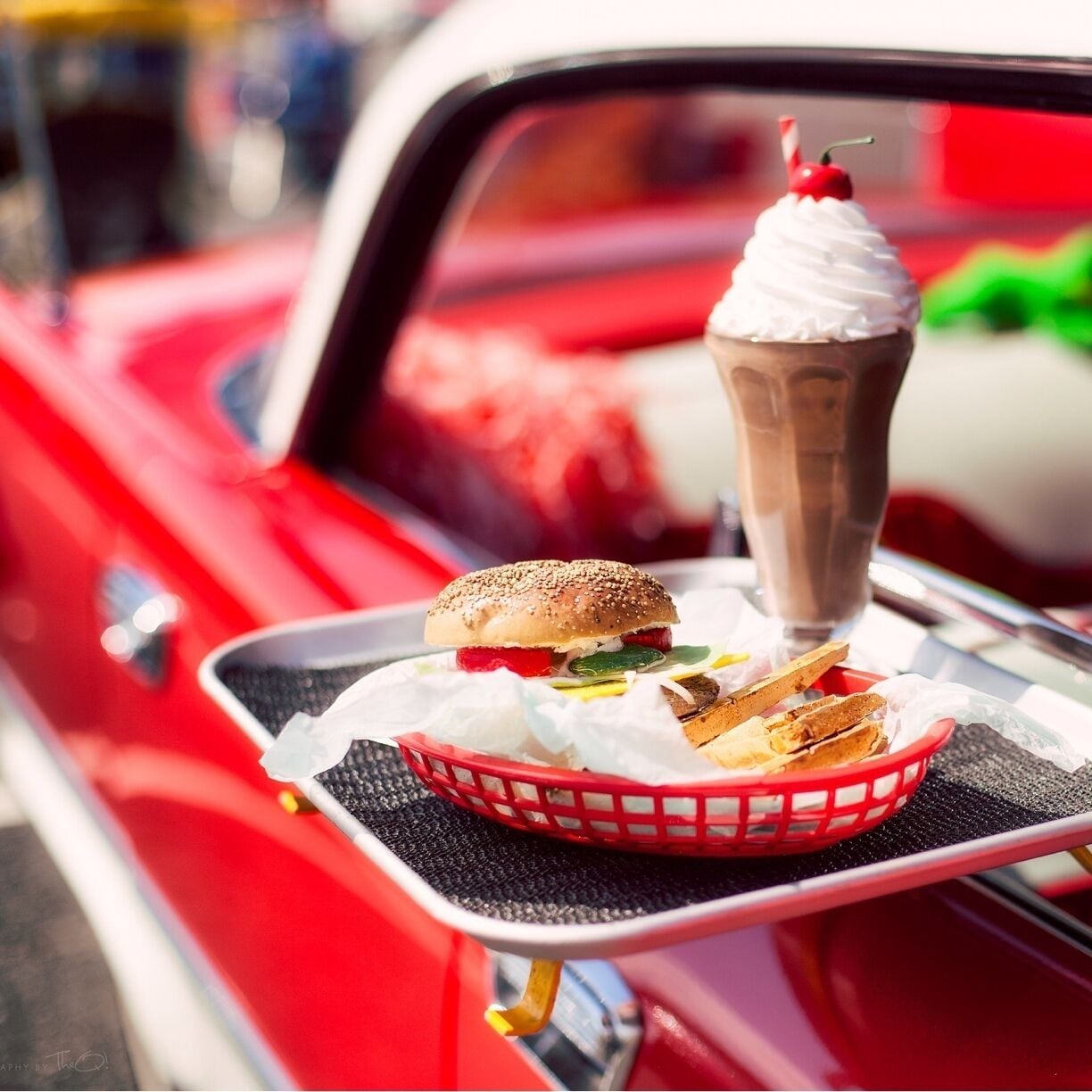 At the Factoria Market Place Classic Car Show. The burger, shake and fries look real enough to make my mouth water!