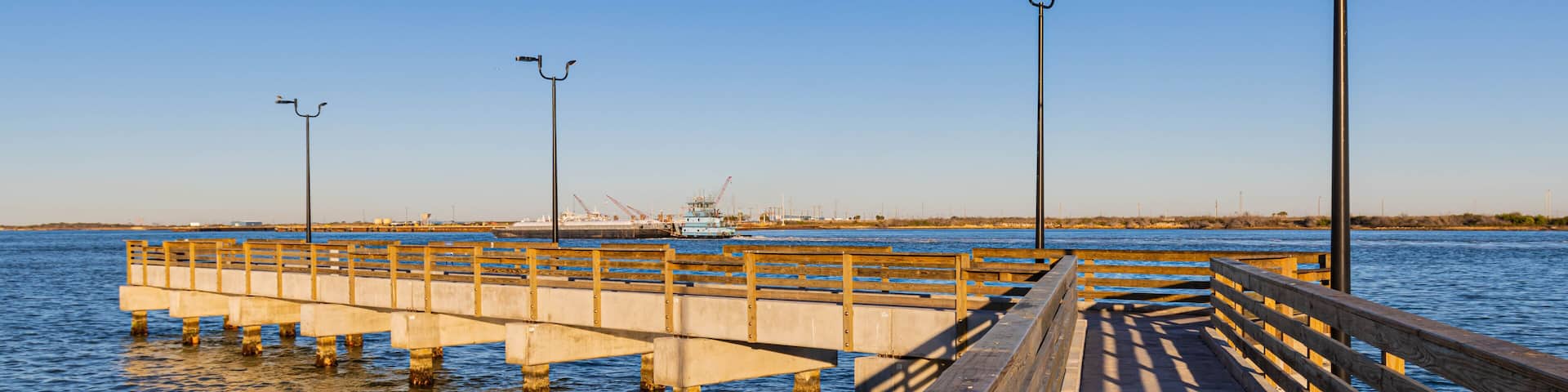 Fishing Pier on The Corpus Christi Ship Channel at Roberts Point Park, Port Aransas, Texas, USA