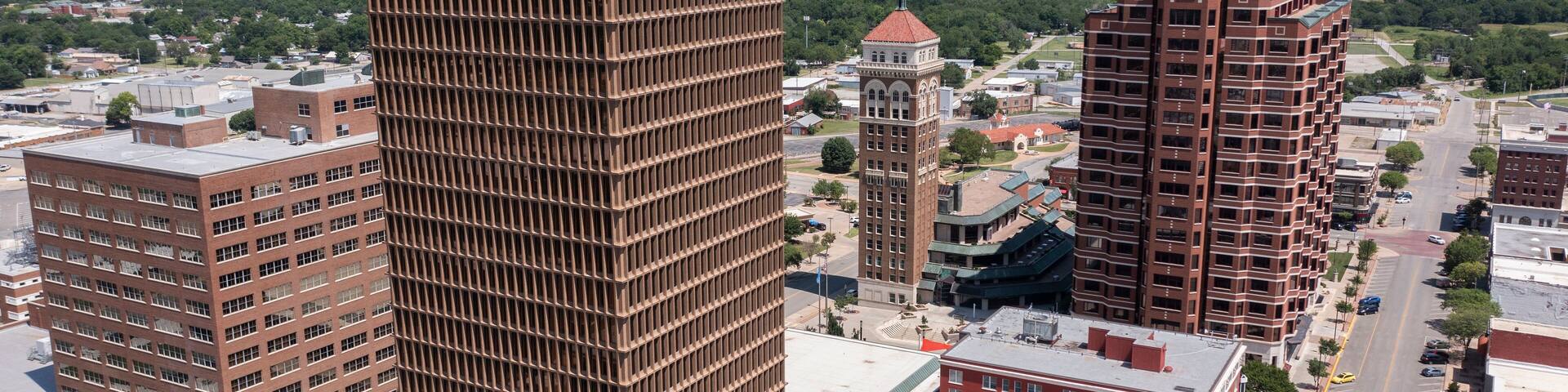 Afternoon sunlight shines on the historic buildings of the downtown skyline of Bartlesville, Oklahoma, USA.
