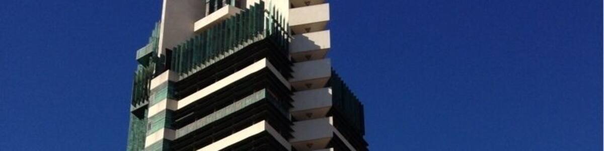 The only Frank Lloyd Wright skyscraper design ever realized, the Price Tower, a 19-story building housing a mix of apartments, offices, and the HQ of the Price Company, was completed in 1956. Today, it's an Inn, a few offices, and a historical site/museum/tour.