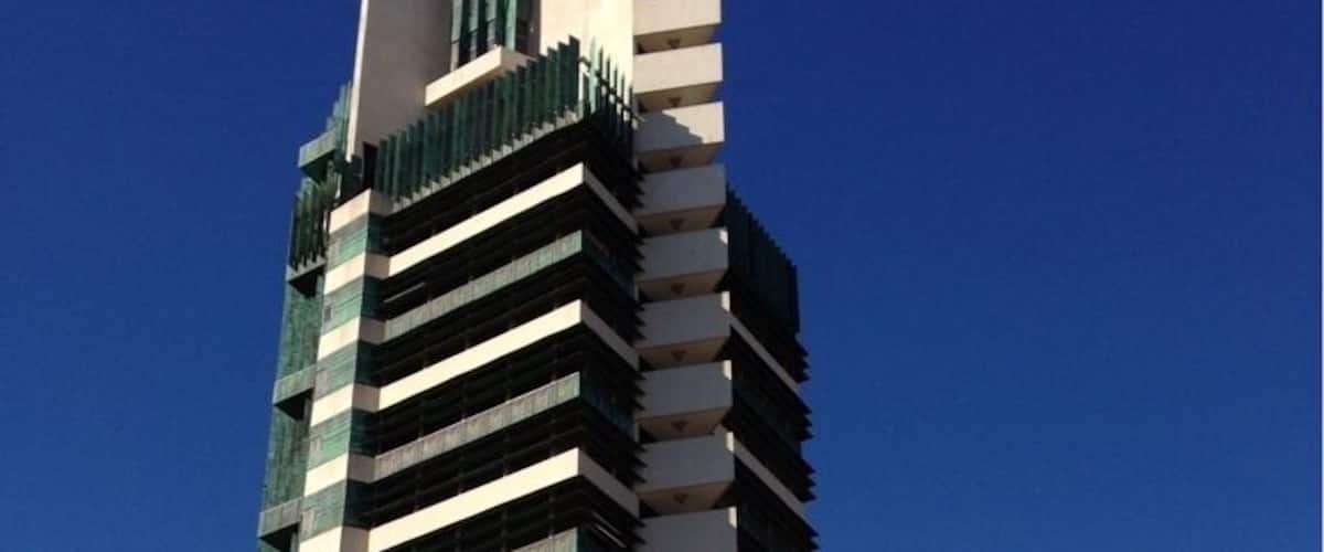 The only Frank Lloyd Wright skyscraper design ever realized, the Price Tower, a 19-story building housing a mix of apartments, offices, and the HQ of the Price Company, was completed in 1956. Today, it's an Inn, a few offices, and a historical site/museum/tour.