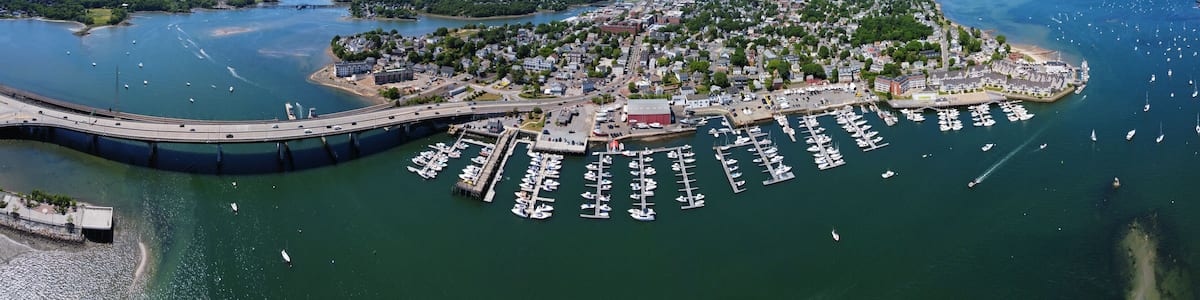 Aerial view panorama of Beverly Port Marina and Essex Bridge at Sandy Point in city of Beverly, Massachusetts MA, USA.