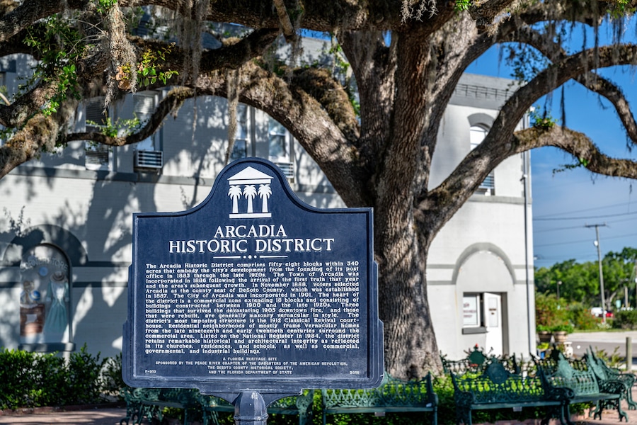 A historic district sign with detailed information about Arcadia's history.