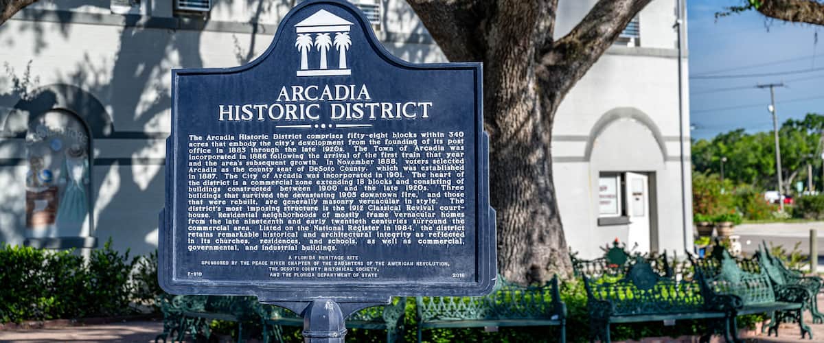 A historic district sign with detailed information about Arcadia's history.