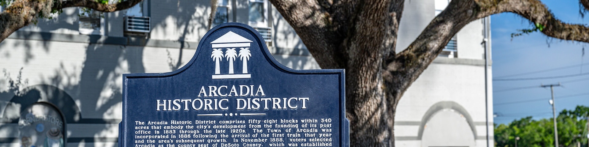 A historic district sign with detailed information about Arcadia's history.