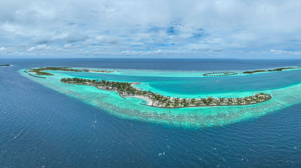Panoramic aerial view of Fari Island surrounded by the Indian Ocean, Maldives archipelagos.