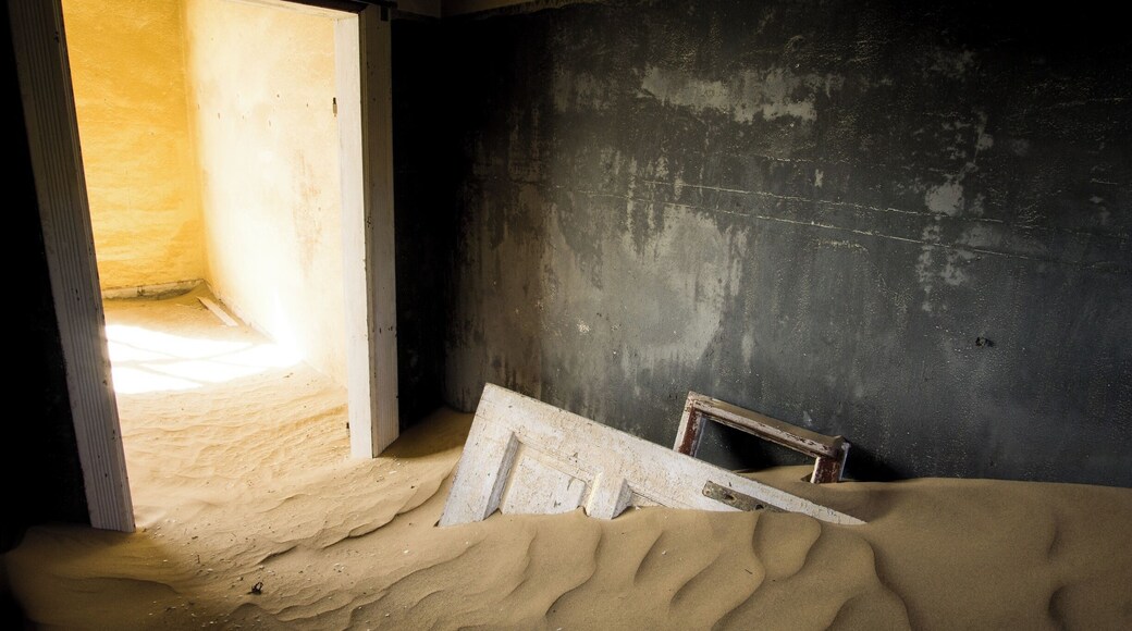 Kolmanskop is a ghost town located in Namibia. People there used to mine diamond, but they all left. The particularity of this ghost town is that the surrounding dunes (yes, this town is located straight in the middle of the desert !) are entering the house and make this place quite unique !
I would definitely recommend going there !
note : the place is only accessible in the morning, because it is way too windy in the afternoon, and it creates sandstorms. The site is only accessible from 8am to 12 but there are special permits for photographers to go there for sunrise or sunset.