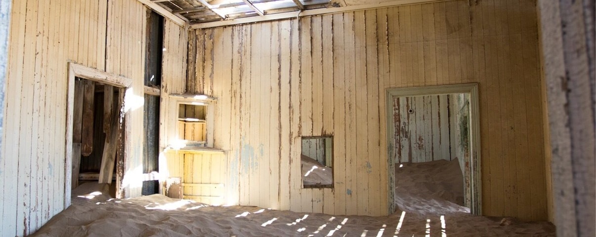 Tour through the ghost town Kolmanskop.It used to be a diamond town that the Germans created in Namibia.Later everyone deserted the town because there were more bigger diamonds found in another town.Now all that is leftover is the empty buildings with lots of sand inside.#kolmanskop#namibia#germantown#ghosttown#ghosttour