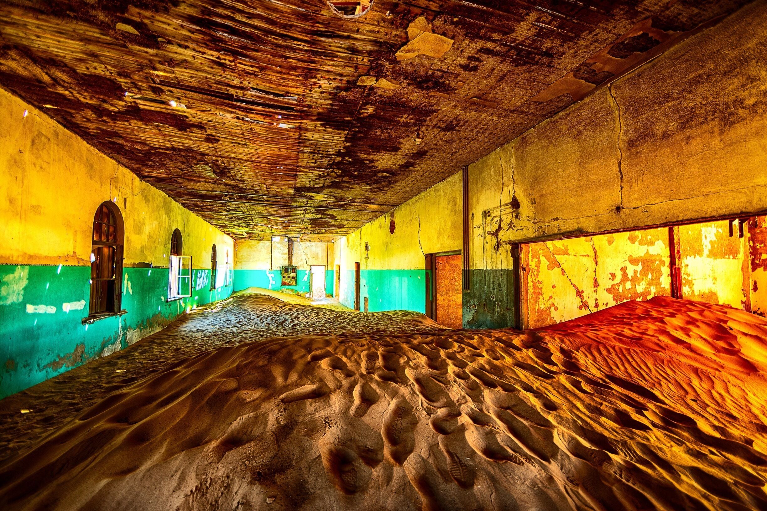 Take a tour or walk around yourself in this ghost town.  An old diamond mine which was occupied by the Germans before they up and left. Now the desert has claimed back the town and started to fill all the old buildings with sand.  Quite a site and you can also get a photographer pass for early entry and late sunset access.