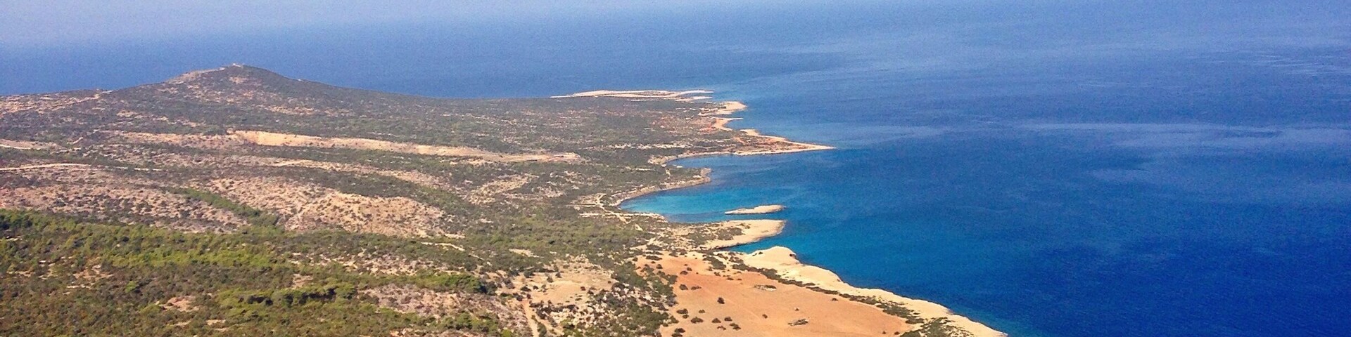 If you park at Aphrodite baths and follow the walking trail it will take you to this spot height that looks over the akamas peninsular national park. Half way down you can see the blue lagoon!
