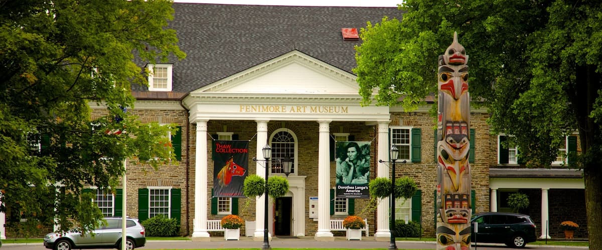 The Fenimore Art Museum with a prominent totem pole in front.
