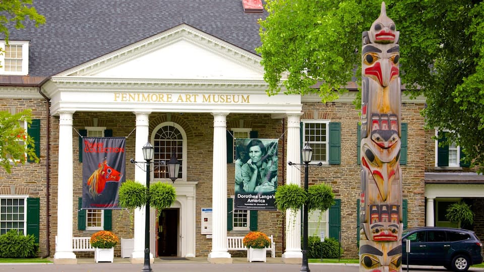The Penmore Art Museum with banners and a totem pole.