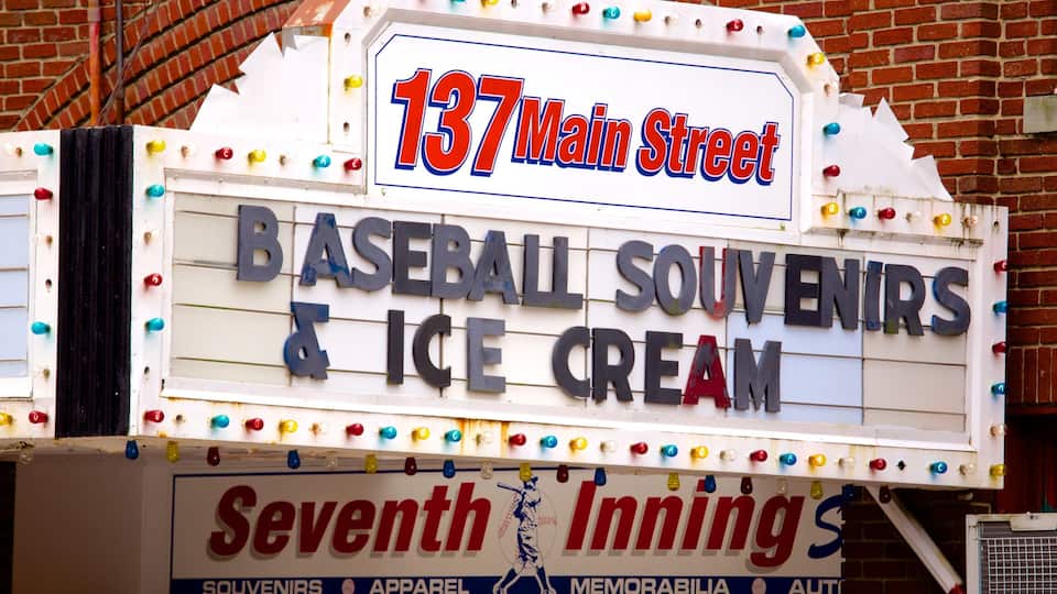 A marquee with '137 Main Street' and 'Baseball Souvenirs & Ice Cream' signs.