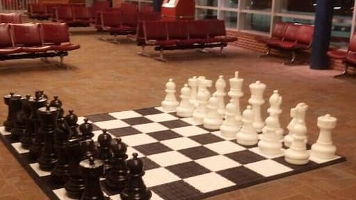 Novelty sized chess while you wait for your flight?