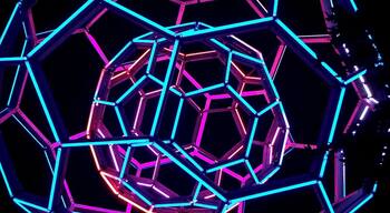 The Bucky Ball is located in front of Crystal Bridges Museum of American Art in Bentonville, AR. It is illuminated from 10 am to 11 pm every day. There are some wonderful wooden lounge chairs that you can use to sit back and watch the ball change colors. There are too many color combinations for you to remember and everyone is prettier than the last. There is no charge to access the area around the sculpture.