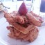 Chicken and waffles at the art museum. It is the best chicken and waffles I have ever had. It is waffles and chicken covered in a jalape?o maple syrup, all topped with a strawberry.