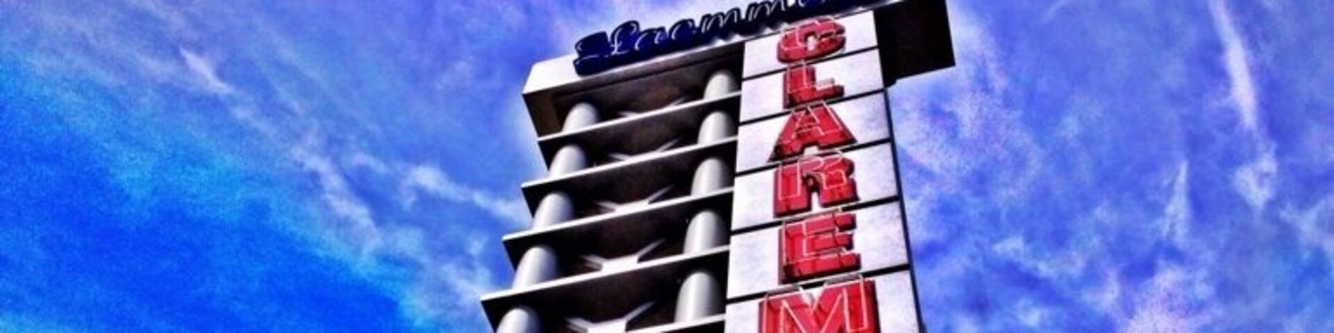 A building with a sign that reads "CAREMONT" and "5".