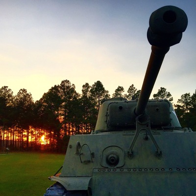 Sunset over Army tank.