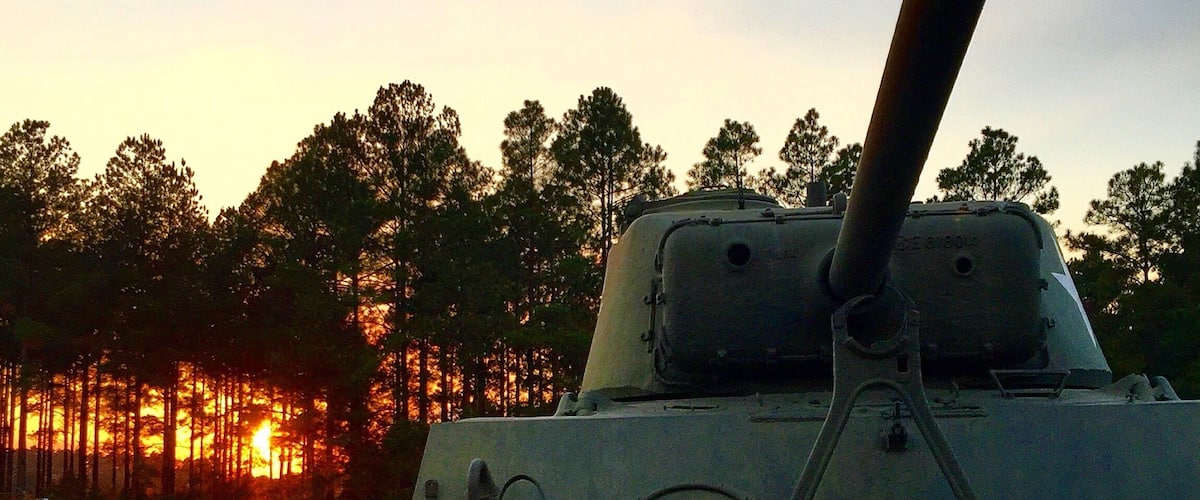 Sunset over Army tank.
