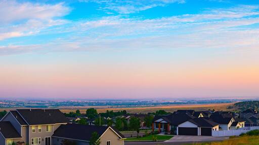 Sunrise over the Pocatello, Idaho, USA: The Tranquil Summer Dawn Landscape of the Gateway City in Caribou-Targhee National Forest of the Rocky Mountains