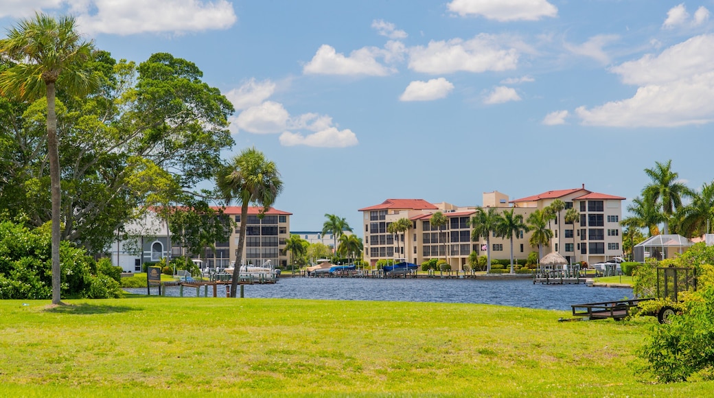 Cape Coral which includes a lake or waterhole and a garden
