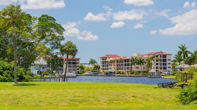 Cape Coral which includes a lake or waterhole and a garden