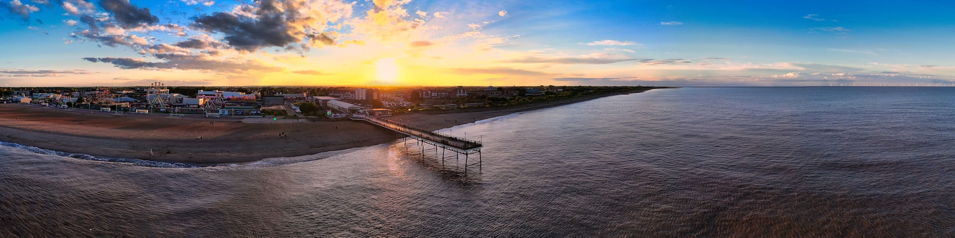 Panorama of the popular seaside holiday resort of Skegness on the east coast of england. Warm summer tones and sweeping vista views