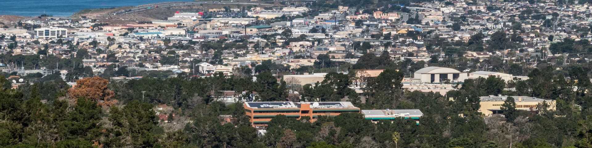 View of Monterey Bay in California, from a nearby hilltop, including cities of Monterey and Seaside.