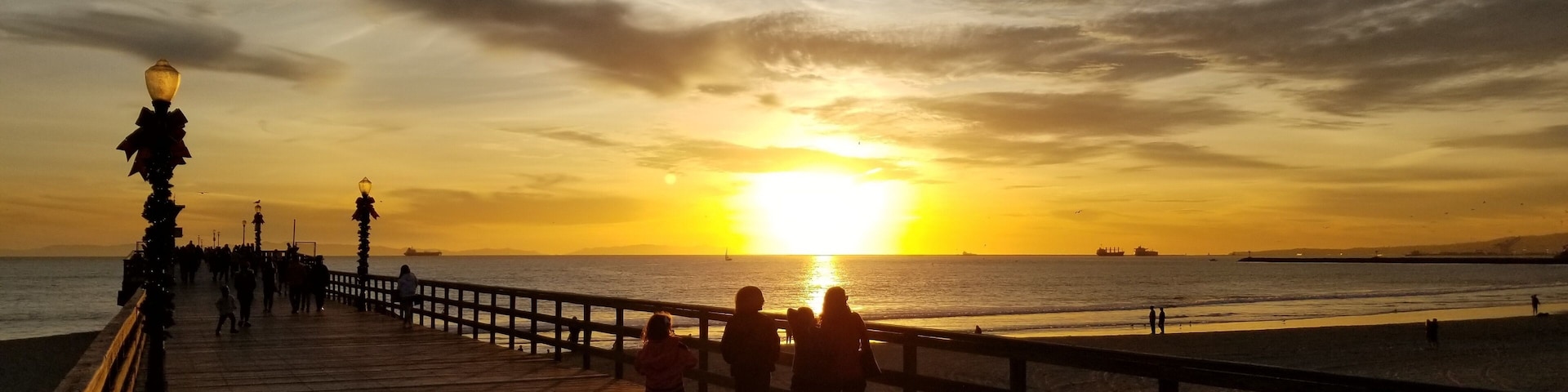 Even during in December, sunsets on the beach are beautiful. The beach communities in Southern California decorate the boardwalks with wreaths and lights, but it definitely doesn't look like winter here. #LifeAtExpedia #Nature
