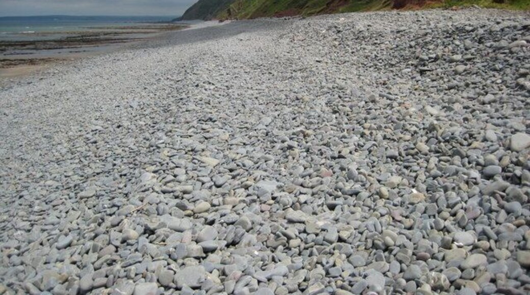 Portledge Beach Portledge Beach is pebbly, however, low tide does expose some sand as well as rocks. View northwards up the coast to Higher Rowden.