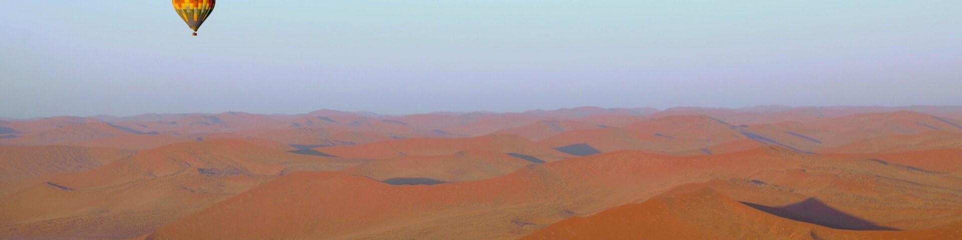 This is a picture I took on my first and only so far hot air balloon ride. It was in Namibia looking over Sossusvlei dunes. They are some of the oldest dunes in the world and how they measure their age is partially dune by the color. The sand here has a tiny amount of iron in it and with a lot of age eventually rusts and that is what that orange color is. This trip was with Namib Sky Balloon Safaris and they had a wonderful trip followed by breakfast by the dunes. Today is the 2 month anniversary of my fathers death and the sadness is nearly overwhelming me, I am trying to fight it off with pictures from past adventures which act as my patronus and remind me of all the beauty and wonder in the world.
