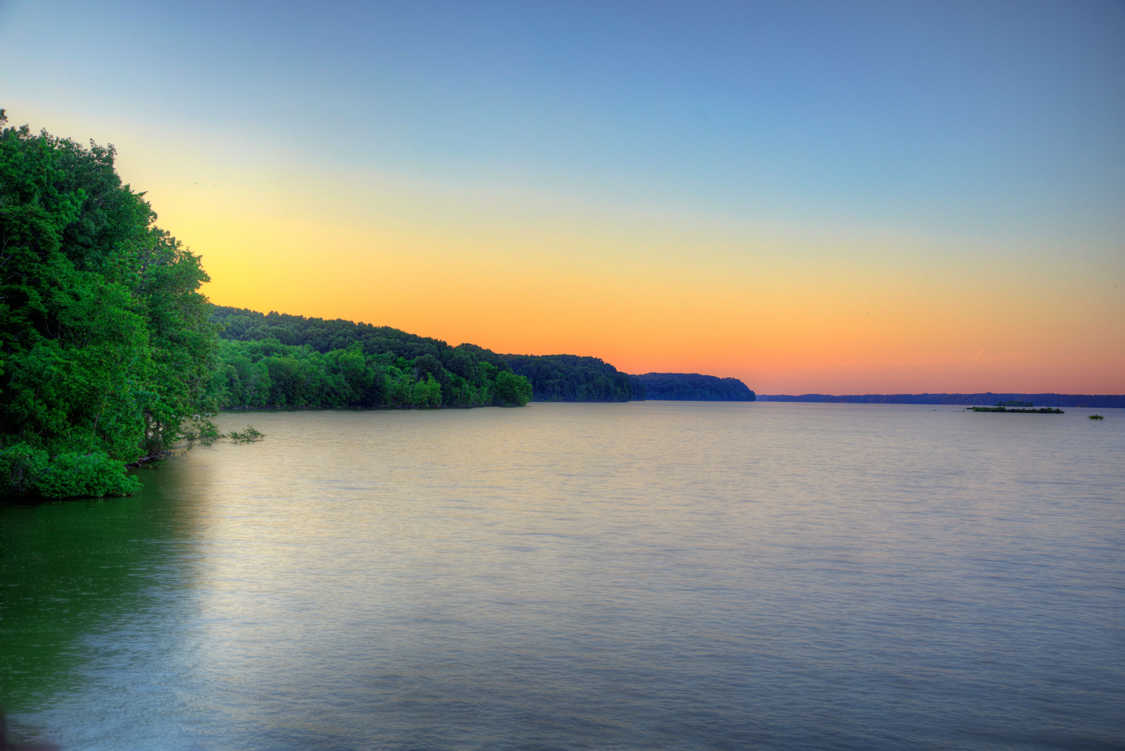 Lake Barkley at Dusk Lake Barkley Kentucky  A pleasing view of Lake Barkley taken from under the Lake Barkley Bridge on US 68, just minutes after sunset on a cloudless evening.
