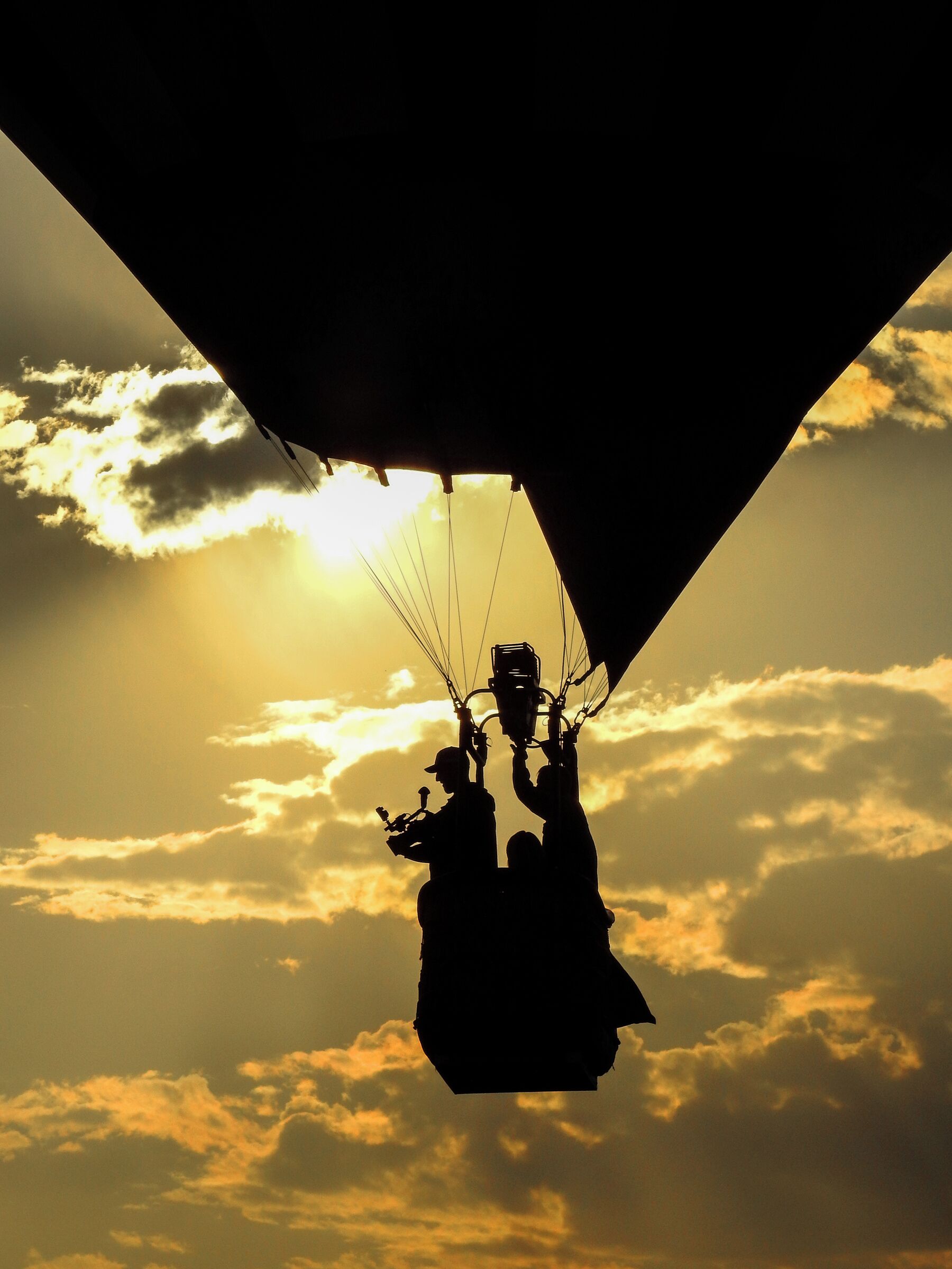 At the end of August and the beginning of October we have The Spirit of Boise Balloon Classic every year. Five days of exciting hot air balloon adventures for kids of all ages! I was in flight during Media Day when I shot this image of a videographer shooting from his perch high above Boise.