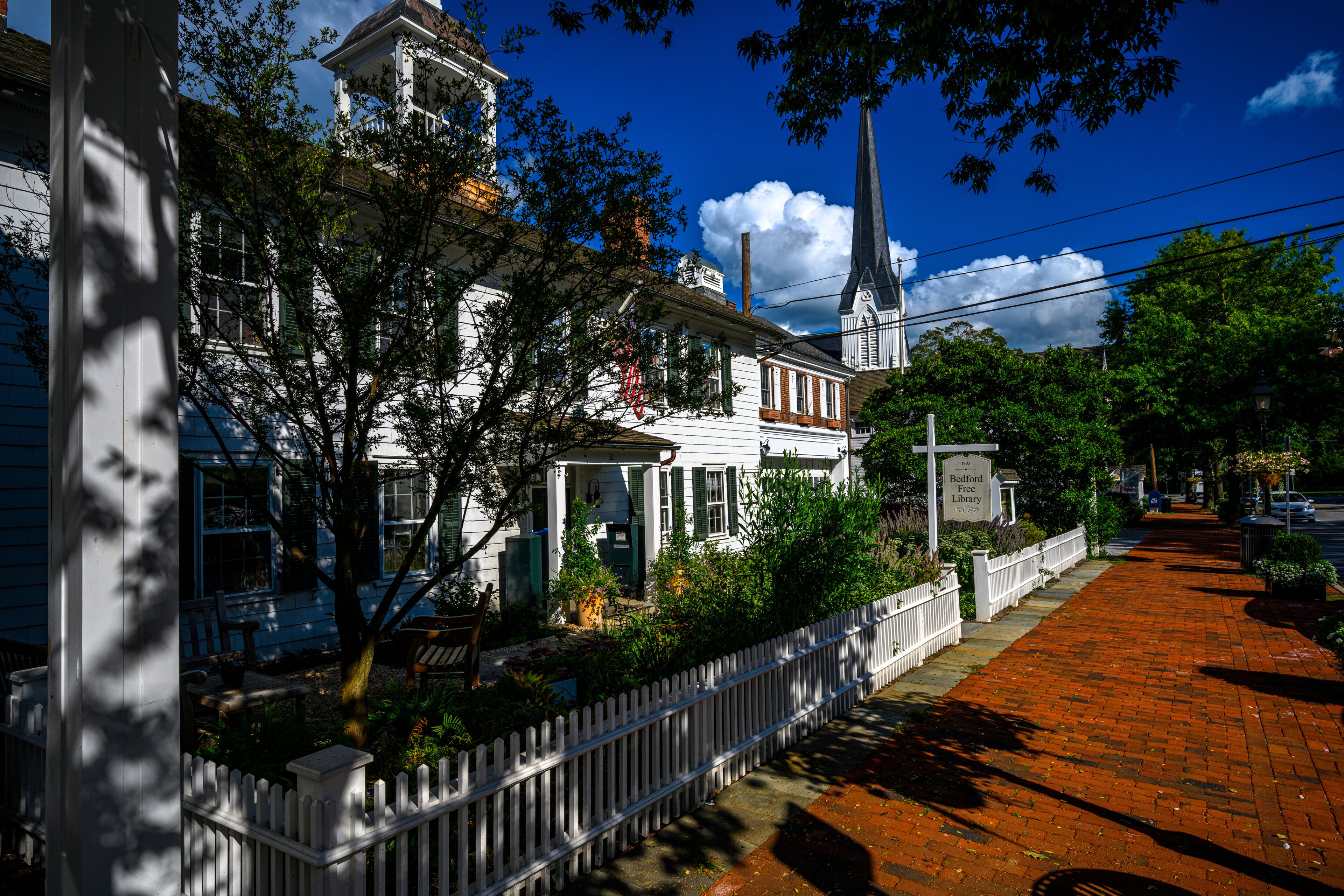 Old Post Road in Bedford Village Historic District on a sunny summer day; Bedford, NY, USA