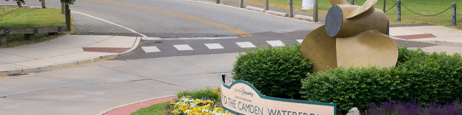 Camden which includes a park, flowers and outdoor art