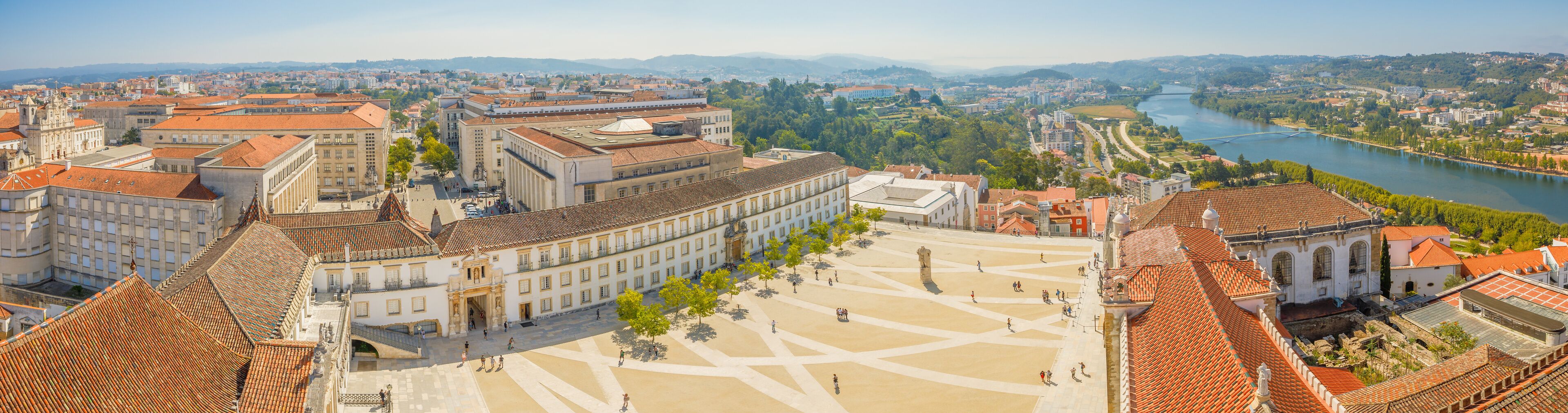 Coimbra panorama from top of bell clock tower. Coimbra city skyline and University courtyard on Mondego river. Coimbra in Central Portugal, is famous for its University, the oldest in Europe.