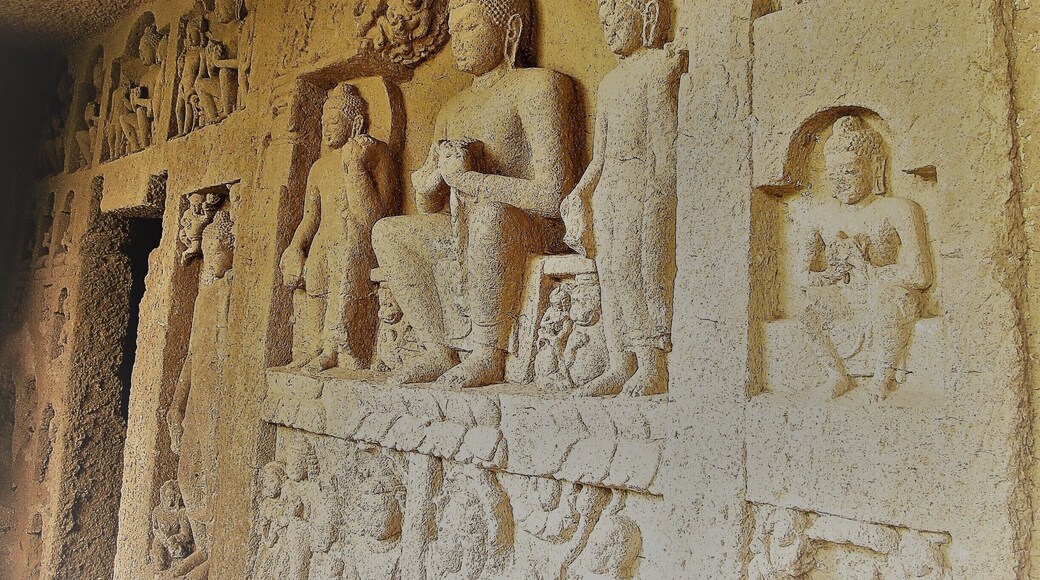 Carvings in the rock at the Kanheri caves, Mumbai, India.
These are a group of over 100 caves in the Sanjay Gandhi National Park in the suburb of Mumbai and the park claims it is one of the most visited parks in any big city. The caves that date back from the 1 BC through 10 century CE, were cut in the hillside and were used by Buddhists as wharas or homes for living, meditating and learning. The larger caves however were halls for community worship and have intricately carved Buddhist sculptures, pillars and stupas. You can also see the drainage system on how rain water was collected and used in the caves. Great place to visit while in Mumbai especially in the monsoons when there are little water runoffs down the hillside and the forest around is vibrant with wildlife especially monkeys. #caves