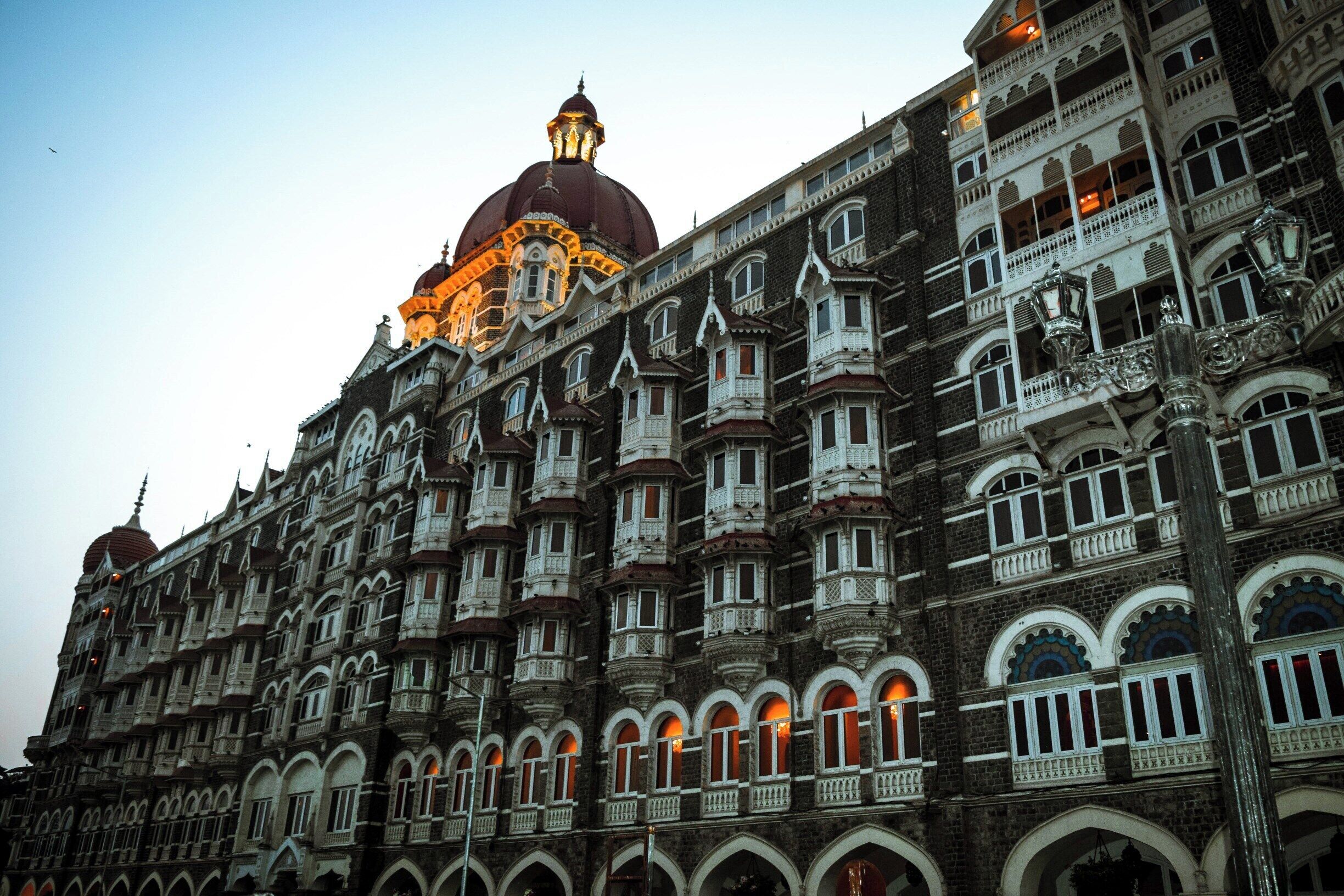 Tal Palace and Towers, my favourite place to stay in Mumbai - the heritage wing is particularly beautiful. The lights on the first floor are from Sea Lounge, an excellent tea place overlooking the Gateway of India and the ocean.