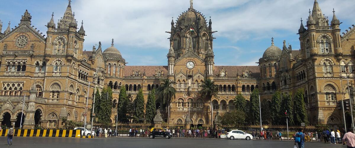 Local train station in historical building in Mumbai