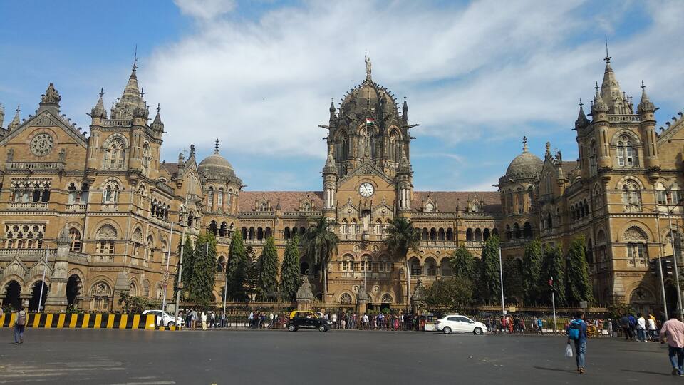 Local train station in historical building in Mumbai